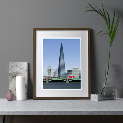 Get living room with a plant and a framed illustration of the Shard and London Bridge